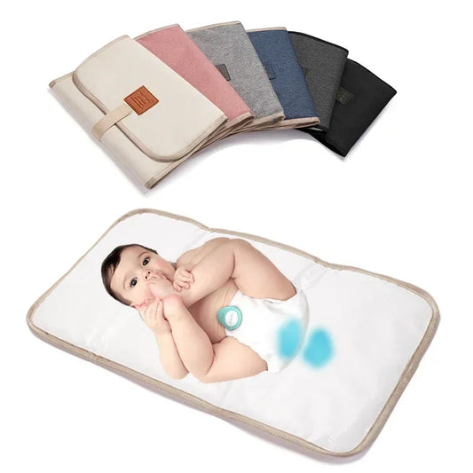 Matelas à langer nomade – Compact, pliable et lavable
